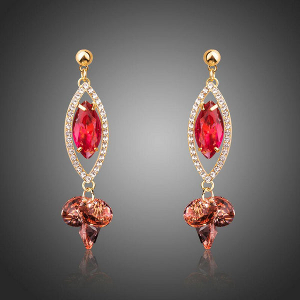 KHAISTA red CZ dangle earrings on white background