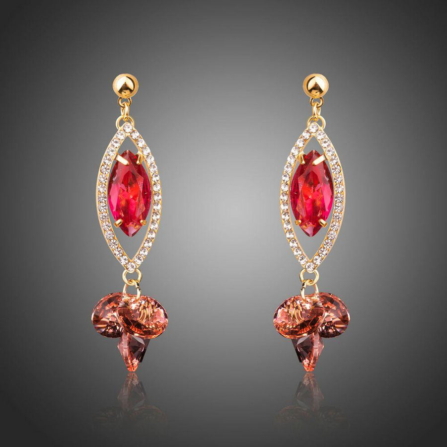 KHAISTA red CZ dangle earrings on white background