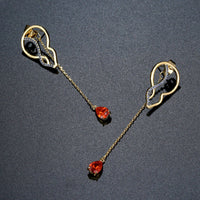 red CZ long drop earrings detail view by KHAISTA