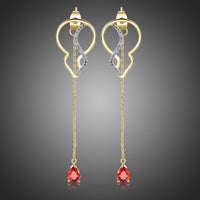 KHAISTA red CZ long drop earrings on white background