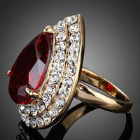Close-up of red cubic zirconia on Khaista teardrop ring