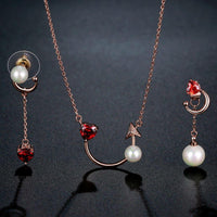 Close-up of red zirconia stones on Khaista heart set