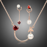 Khaista red zirconia heart jewellery set on white background