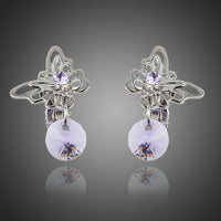 KHAISTA rhinestone butterfly clip earrings on white background
