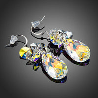Close up of KHAISTA rhinestone crystal water drop earrings
