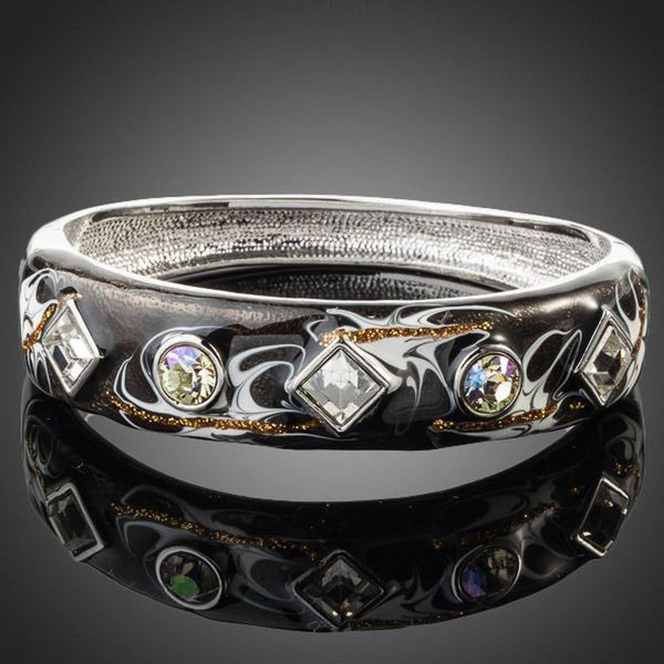 KHAISTA rhodium plated black artistic cuff bangle on white background
