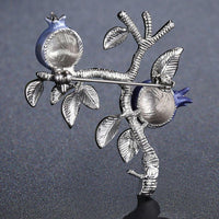 Side angle view of Khaista pomegranate tree brooch