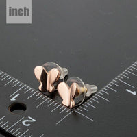 rose gold butterfly earrings detail view by KHAISTA