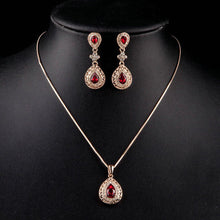 Load image into Gallery viewer, Rose Gold Carved Red Crystal Drop Necklace and Earrings Set - KHAISTA Fashion Jewellery
