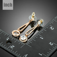 rose gold CZ drop earrings detail view by KHAISTA
