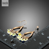rose gold crystal dangle earrings detail view by KHAISTA