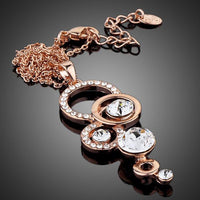 Side angle view of KHAISTA round 1 carat CZ pendant necklace