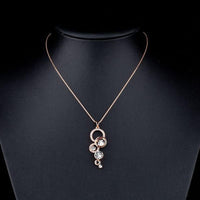 Close up detail of KHAISTA round 1 carat CZ pendant necklace