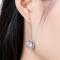 round AAA CZ drop earrings detail view by KHAISTA