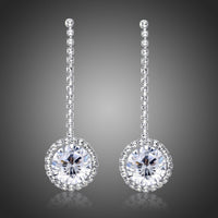 KHAISTA round AAA CZ drop earrings on white background