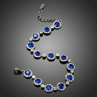 Close up detail of KHAISTA round blue CZ bracelet