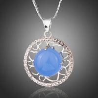 KHAISTA round blue opal pendant necklace on white background