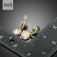 round cage CZ dangle drop earrings detail view by KHAISTA