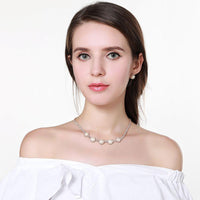 Side angle view of Khaista luxury CZ pearl set