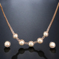 Close-up of CZ and pearl stones on Khaista wedding set