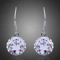 KHAISTA round CZ drop earrings on white background
