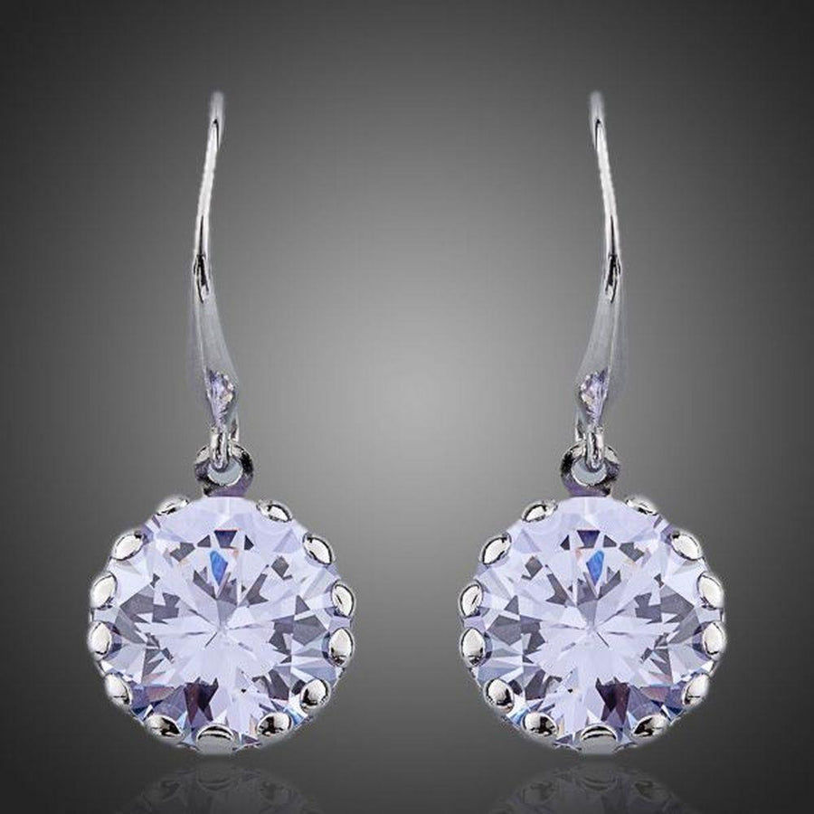 KHAISTA round CZ drop earrings on white background