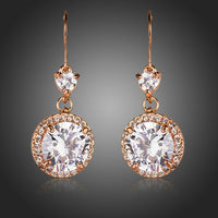 KHAISTA round CZ fashion drop earrings on white background