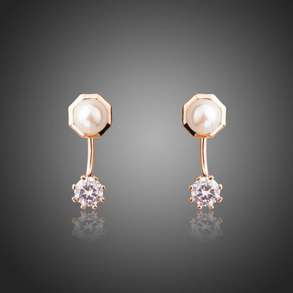 KHAISTA round CZ pearl stud earrings on white background