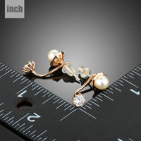 round CZ pearl stud earrings detail view by KHAISTA