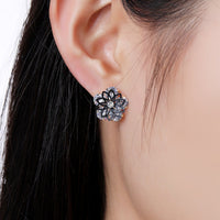 round cut crystal stud earrings detail view by KHAISTA