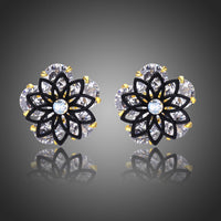KHAISTA round cut crystal stud earrings on white background