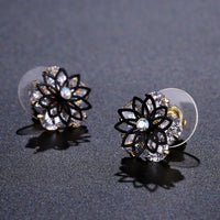 Side angle view of KHAISTA round cut crystal stud earrings