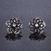 Close up of KHAISTA round cut crystal stud earrings