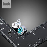 round deep sea crystal stud earrings detail view by KHAISTA