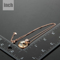 Pendant detail on KHAISTA round link chain crystal necklace