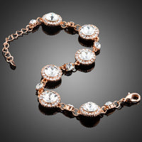 Close up detail of KHAISTA round crystal lobster clasp bracelet