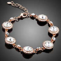 KHAISTA round crystal lobster clasp bracelet on white background