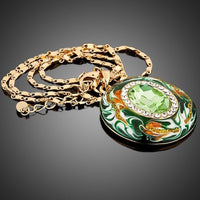 Close up detail of KHAISTA round ocean waves crystal pendant necklace