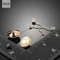 round pearl earrings detail view by KHAISTA