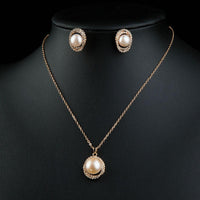 Side angle view of Khaista pearl CZ set