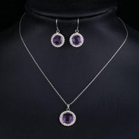 Side angle view of KHAISTA purple crystal set