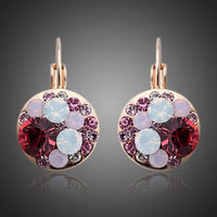 KHAISTA deep red round crystal clip earrings on white background