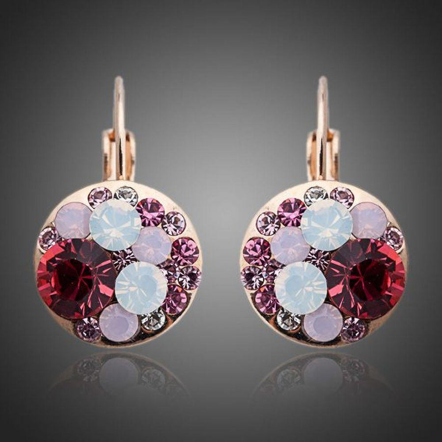 KHAISTA deep red round crystal clip earrings on white background