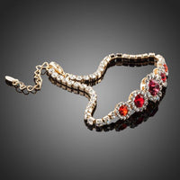 Close up detail of KHAISTA round red classic crystal bracelet