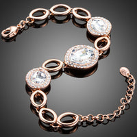 Close up detail of KHAISTA round rhinestone link chain bracelet