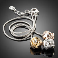 Close up detail of KHAISTA row of roses crystal pendant necklace