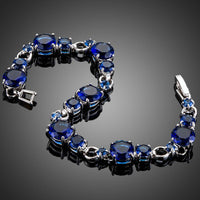 Close up detail of KHAISTA royal blue CZ toggle bracelet