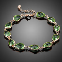 KHAISTA royal green pear cut crystal bracelet on white background