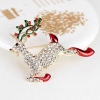 Side angle view of Khaista crystal reindeer brooch
