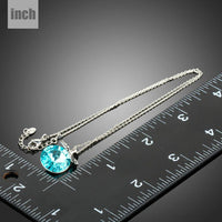 Pendant detail on KHAISTA sea blue Austrian crystal necklace